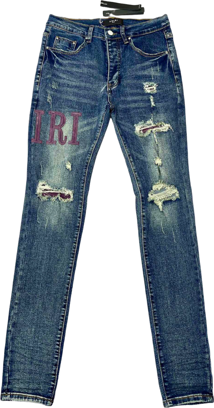 Amiri Jeans Distressed Bleu Délavé avec Logo Imprimé